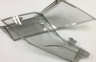 Ruiskuvalumuotti autojen korkean läpinäkyvyyden ajovalaisinosaan